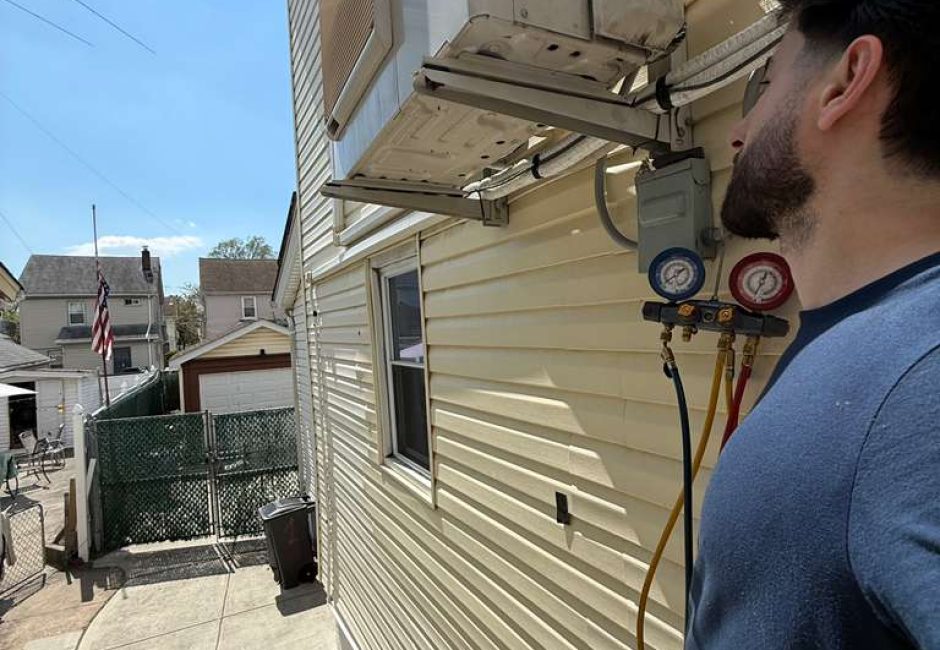 hvac technician after installing a system